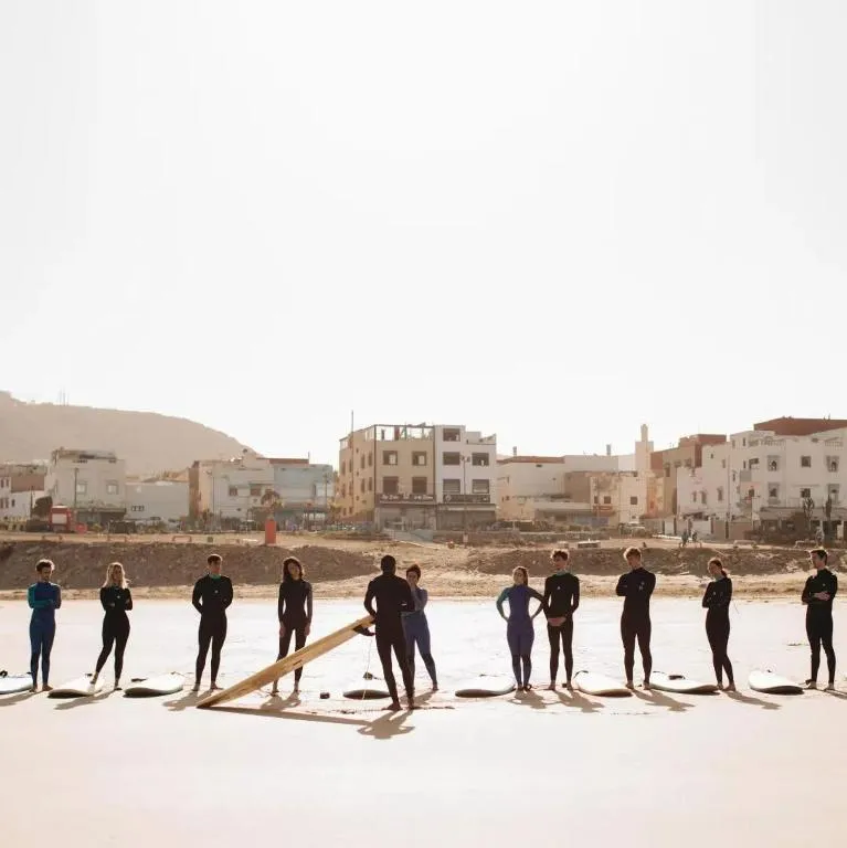 Jamal running a beach class on the morning of a Taghazout surf session